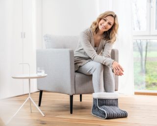 Beurer FW 20 Cosy подложка за крака; Бързо загряване; 3 температурни настройки; BSS; OEKO-TEX; Переща се подплата; 100 вата; 32(Д)х26(Ш)х26(В)