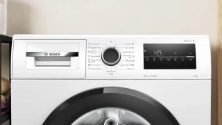Пералня Bosch WAN2826BBY, 9 kg, A, 1400 об/мин, Iron Assist, waveDrum 65 l, черна-черно-сива врата