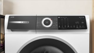 Bosch WGH256A6BY, SER6, пералня 10кг, A, 1600 об/мин, 48/75dB(B), i-DOS, HC, Iron Assist, Touch DirectSelect дисплей, вътрешно осветление, waveDrum 70л, сребърно-черна врата