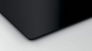 Bosch PUC611AA5E индукционен котлон, 60 см, 3 зони, повърхностен монтаж без рамка, черен