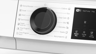 Bosch WQJ24201BY SER6 Сушилня с термопомпа 9кг D/C конденз., 62dB EasyClean, дренажен комплект, черна/черно-сива врата, HC, Наклонен сензорен дисплей директен